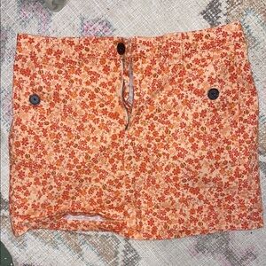 Orange floral mini skirt